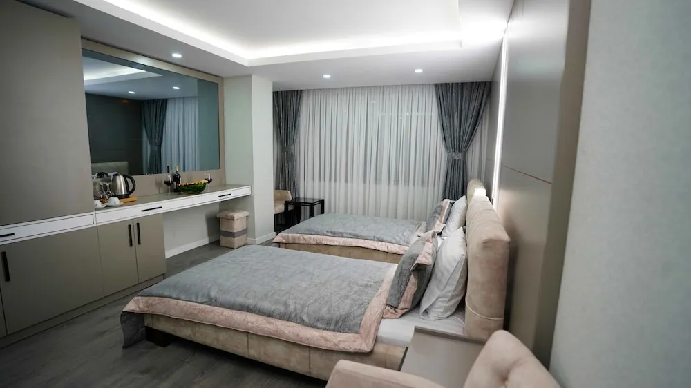 Deluxe Tek Büyük veya İki Ayrı Yataklı Oda