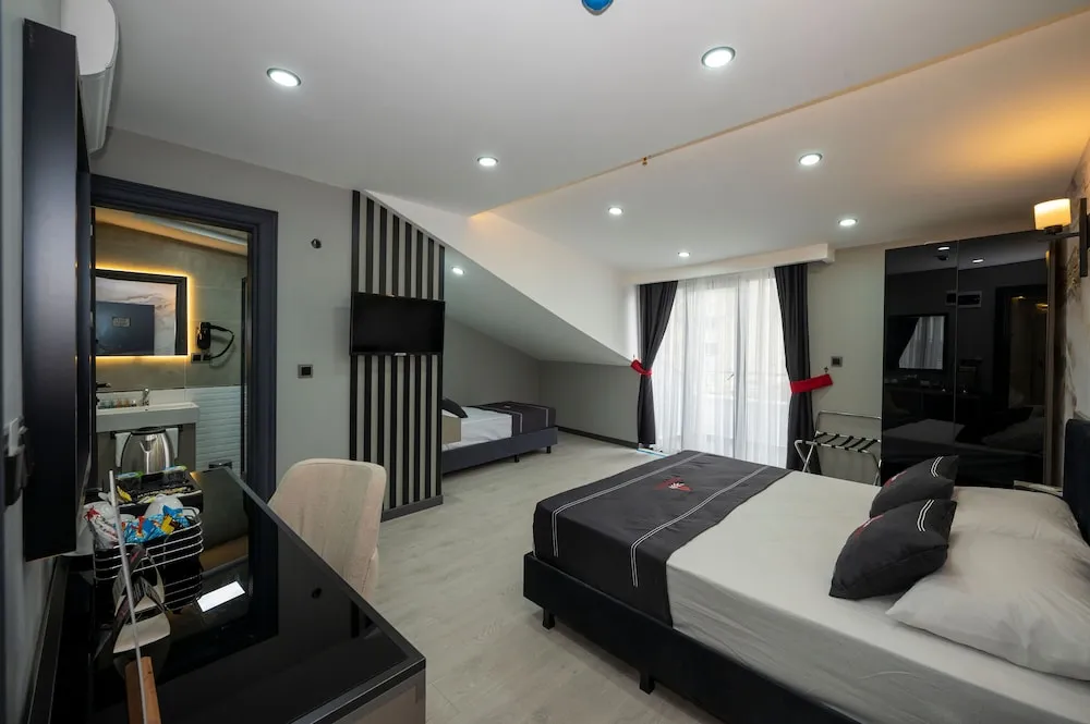 Deluxe Üç Kişilik Oda