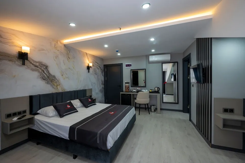 Deluxe Üç Kişilik Oda