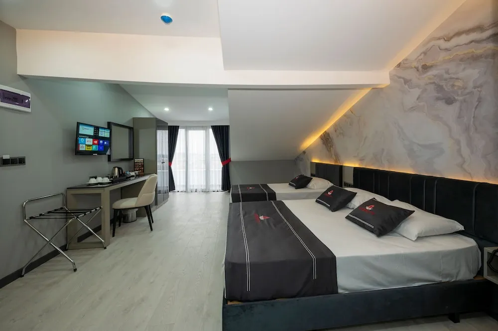 Deluxe Üç Kişilik Oda