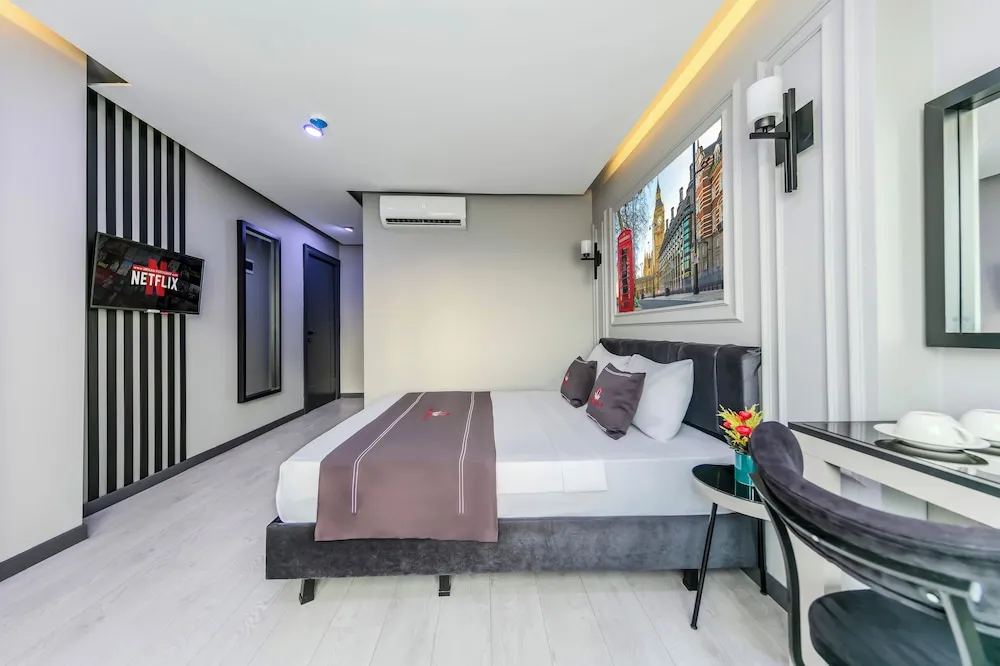 Deluxe Tek Büyük veya İki Ayrı Yataklı Oda
