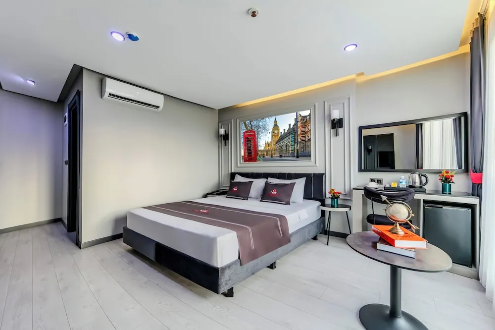 Deluxe Tek Büyük veya İki Ayrı Yataklı Oda