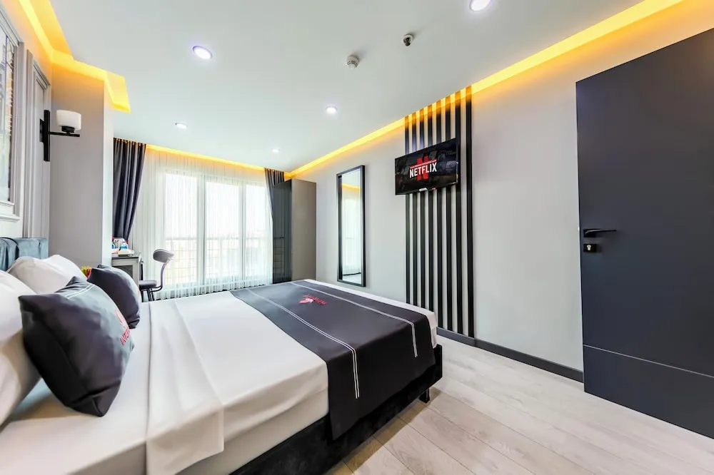 Deluxe Tek Büyük veya İki Ayrı Yataklı Oda