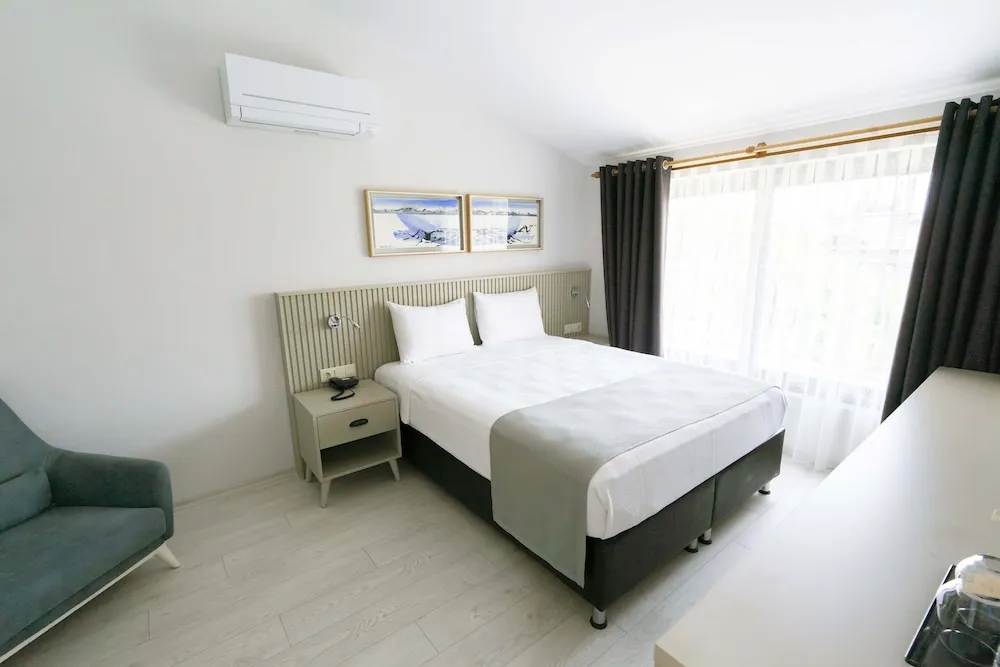 Comfort Tek Büyük veya İki Ayrı Yataklı Oda