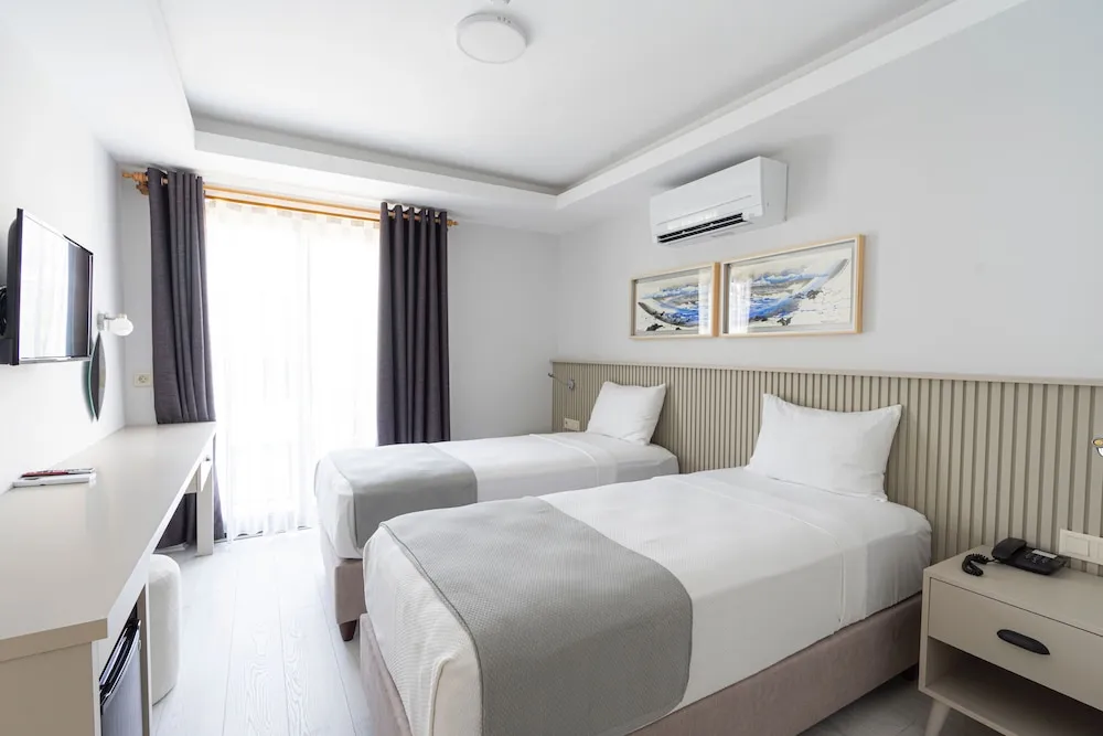 Comfort Tek Büyük veya İki Ayrı Yataklı Oda