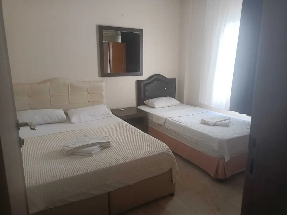 Economy Üç Kişilik Oda