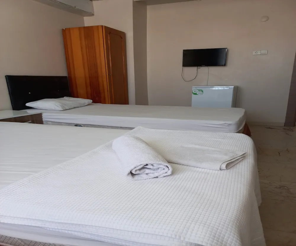 Economy Üç Kişilik Oda