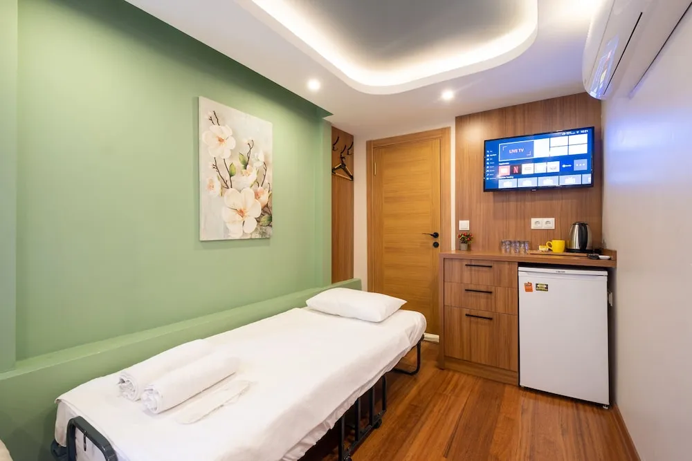 Deluxe Üç Kişilik Oda