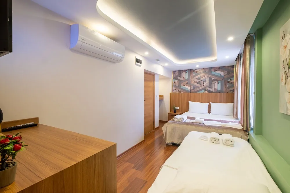 Deluxe Üç Kişilik Oda