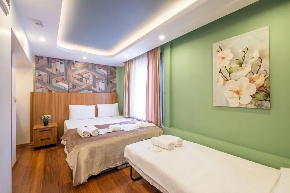 Deluxe Üç Kişilik Oda