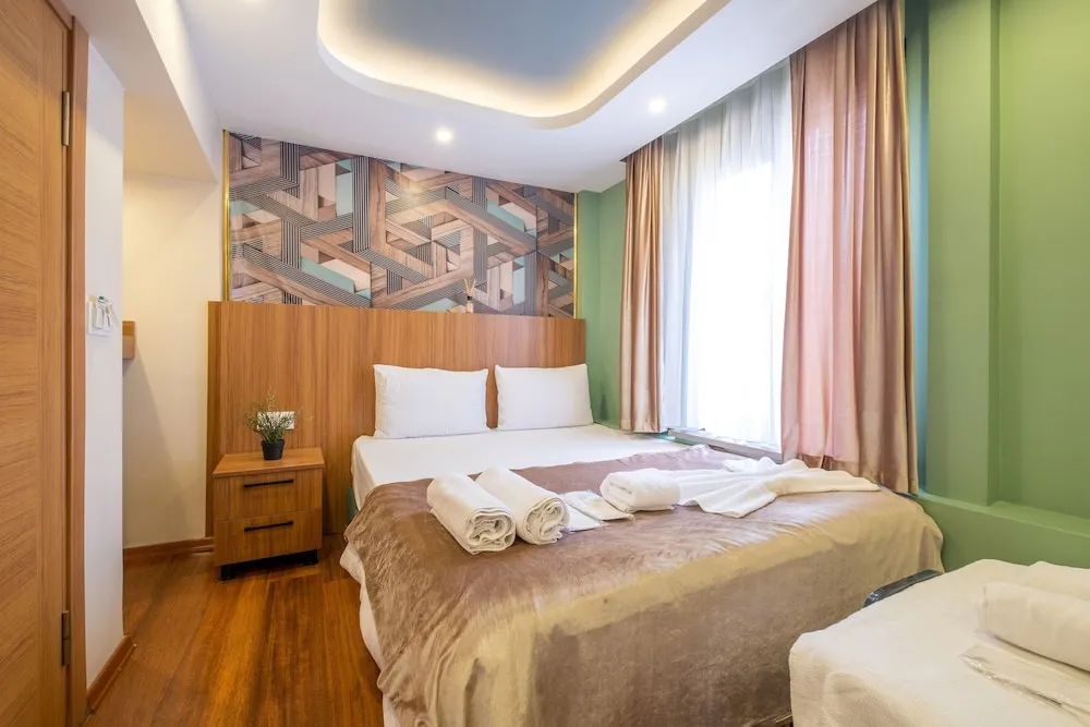 Deluxe Üç Kişilik Oda
