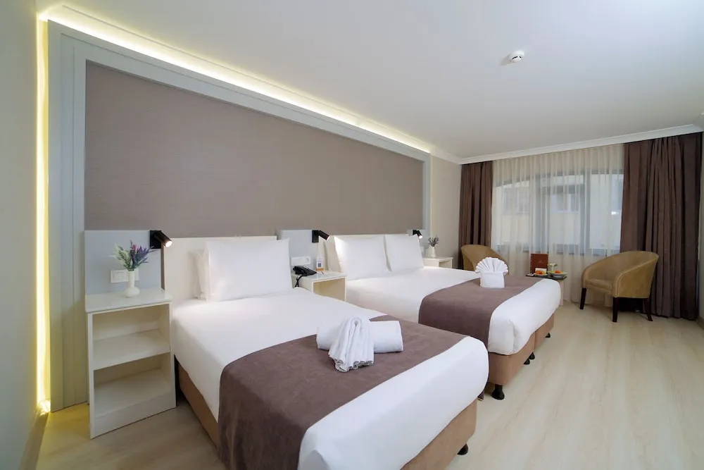 Deluxe Üç Kişilik Oda