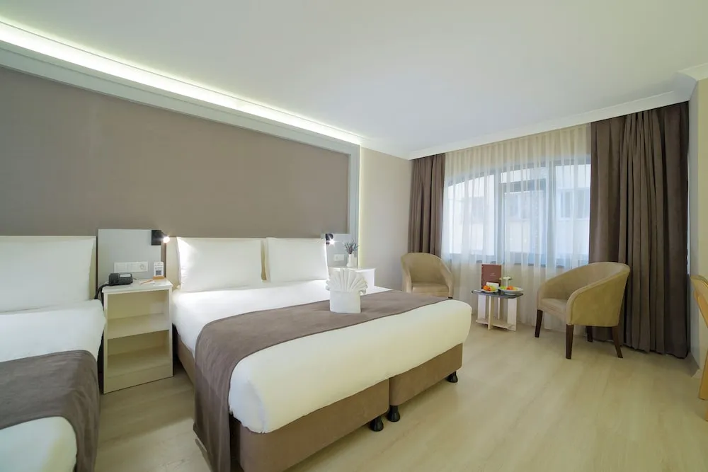 Deluxe Üç Kişilik Oda
