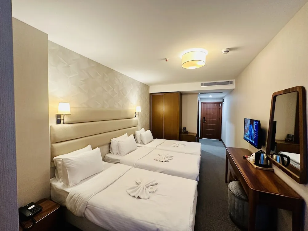 Deluxe Üç Kişilik Oda