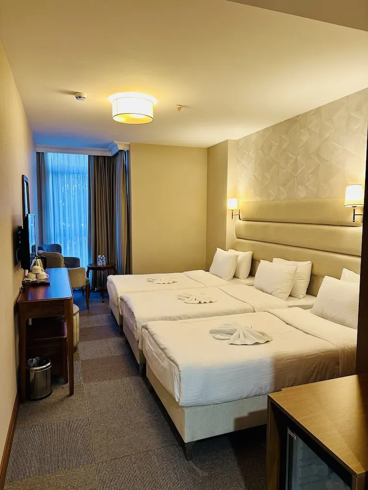 Deluxe Üç Kişilik Oda