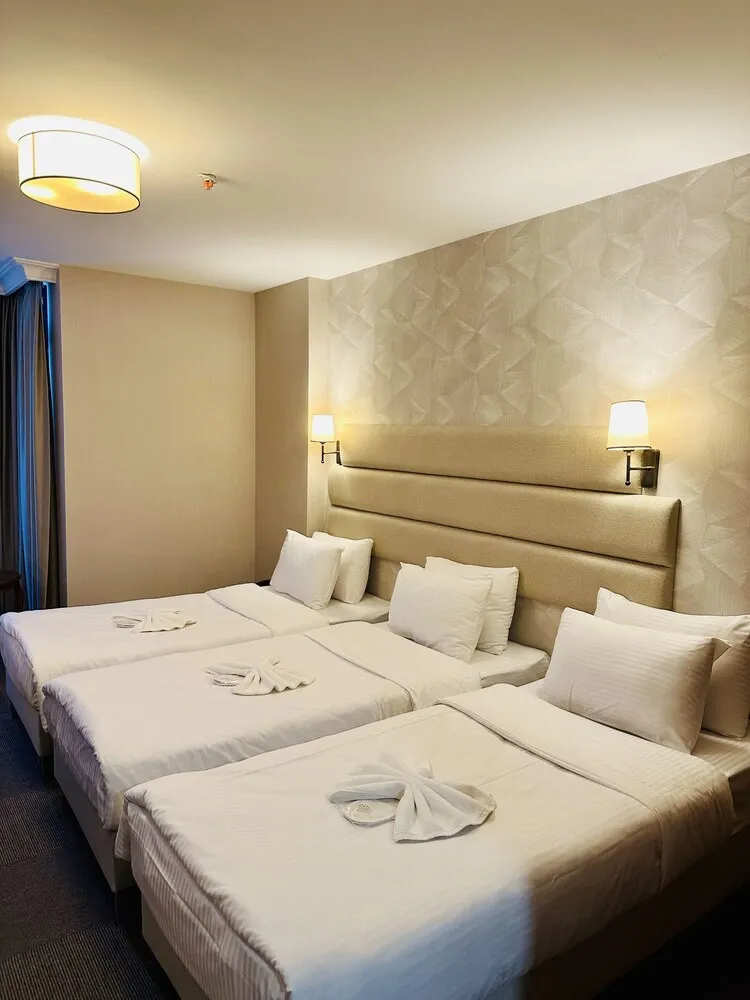 Deluxe Üç Kişilik Oda