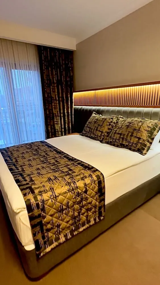 Deluxe Tek Büyük veya İki Ayrı Yataklı Oda