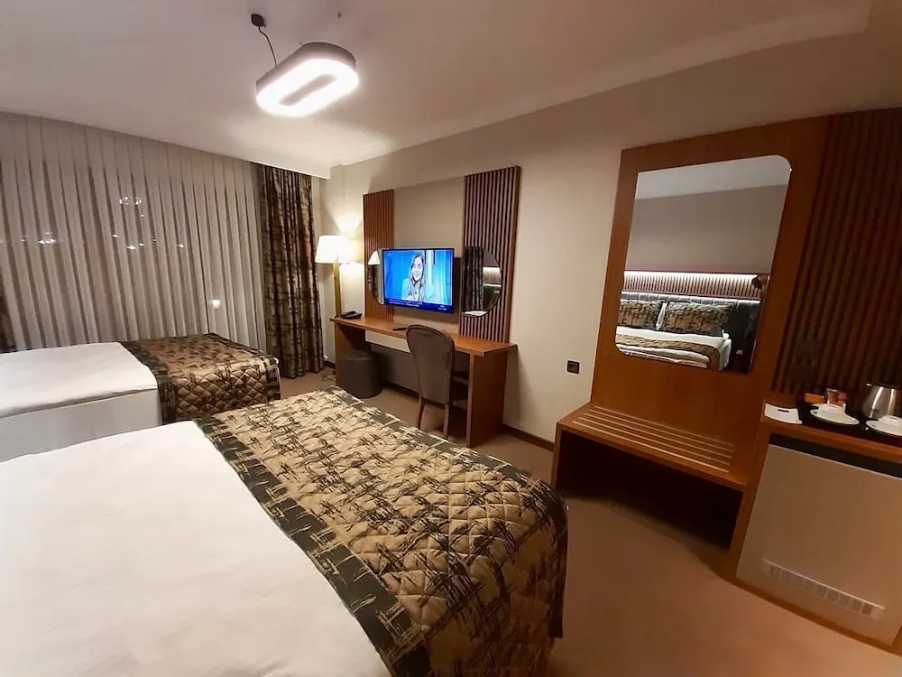 Deluxe Üç Kişilik Oda
