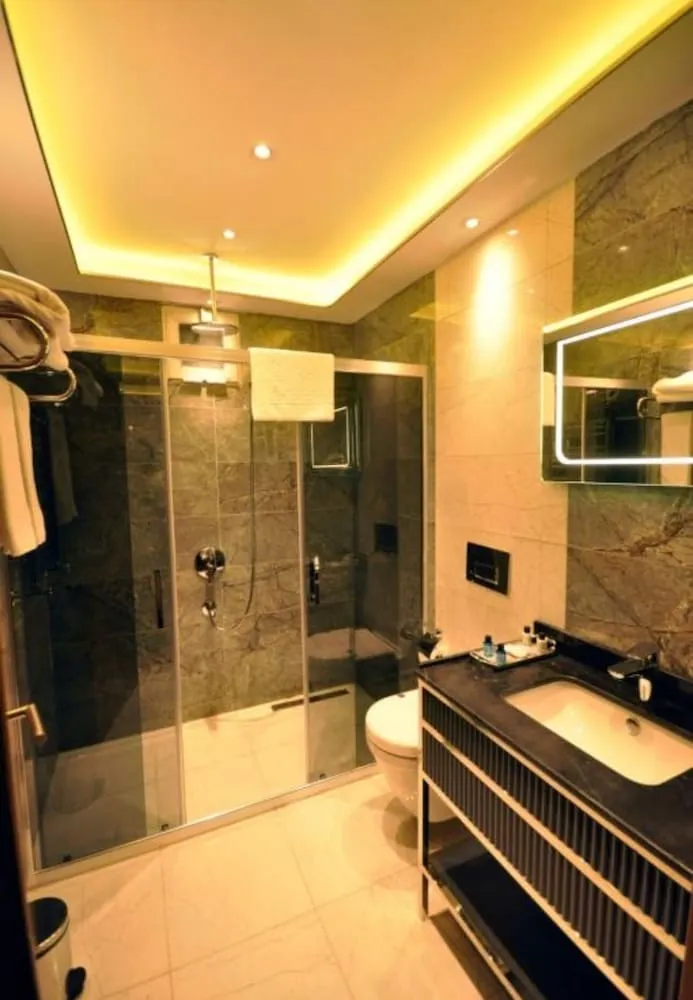 Deluxe Üç Kişilik Oda