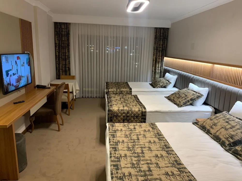 Deluxe Üç Kişilik Oda