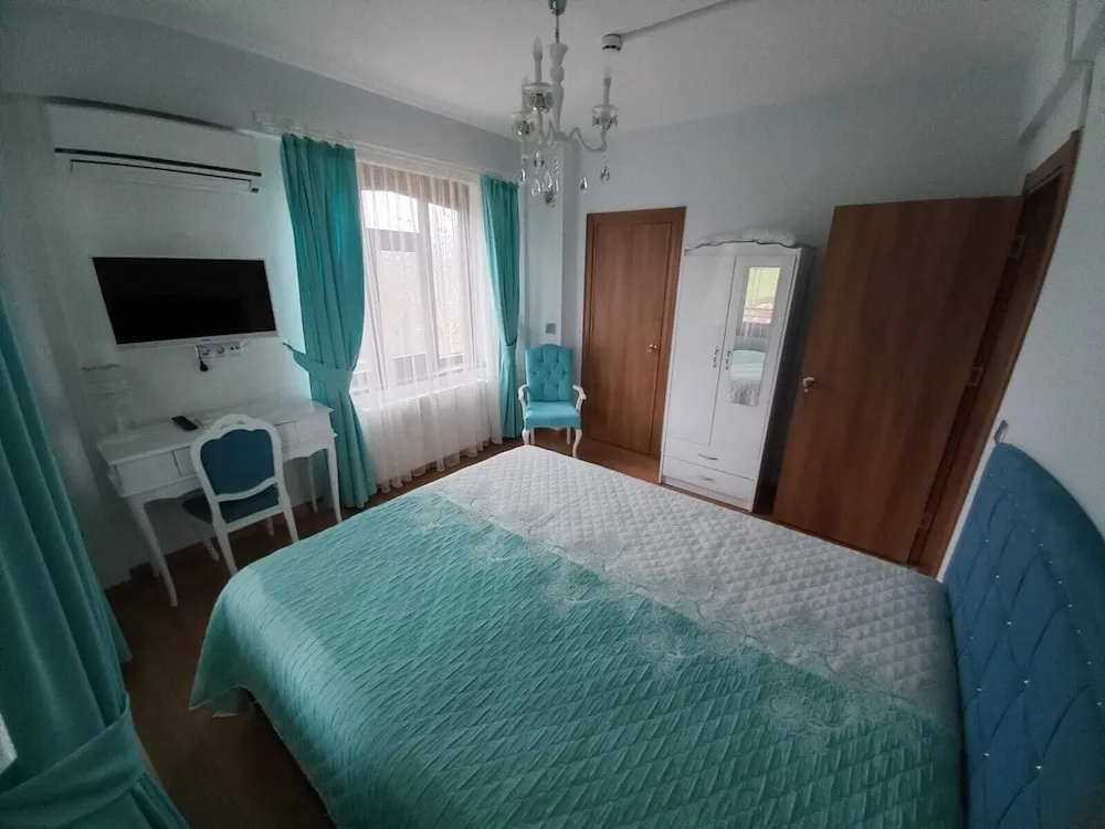 Deluxe Tek Büyük veya İki Ayrı Yataklı Oda