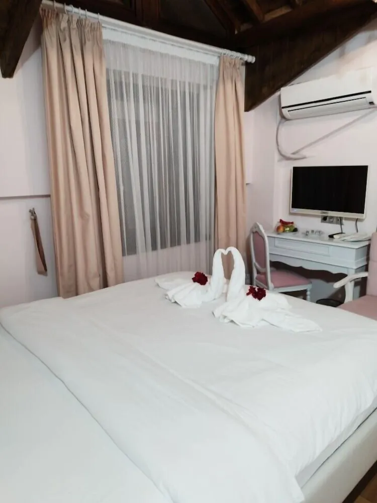Deluxe Tek Büyük veya İki Ayrı Yataklı Oda