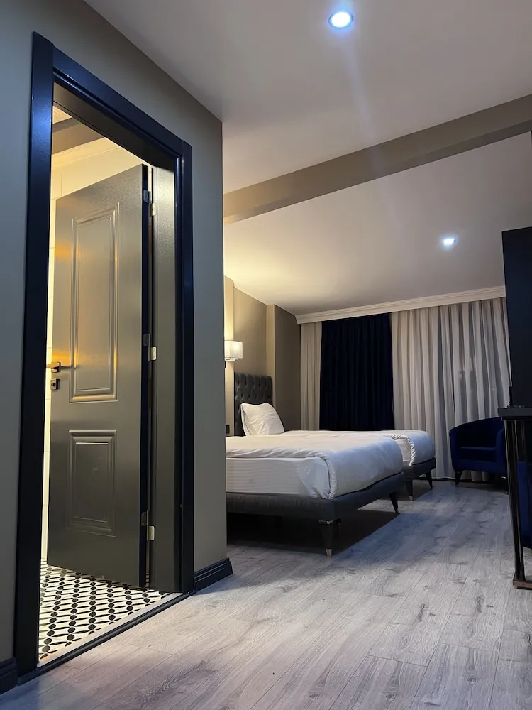 Deluxe Üç Kişilik Oda