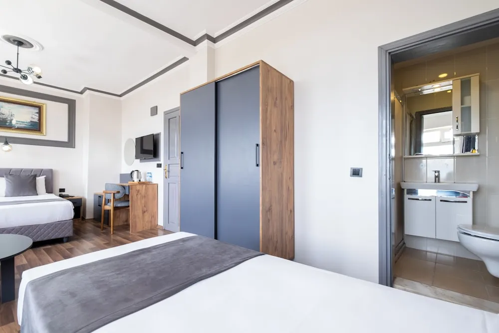 Deluxe Üç Kişilik Oda, Deniz Manzaralı