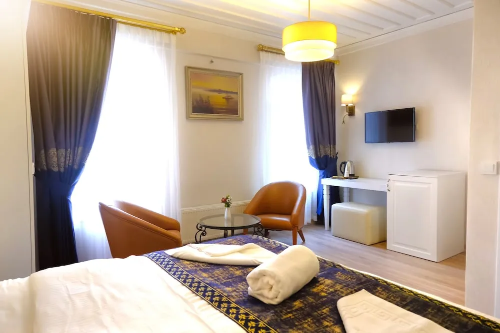 Deluxe Üç Kişilik Oda