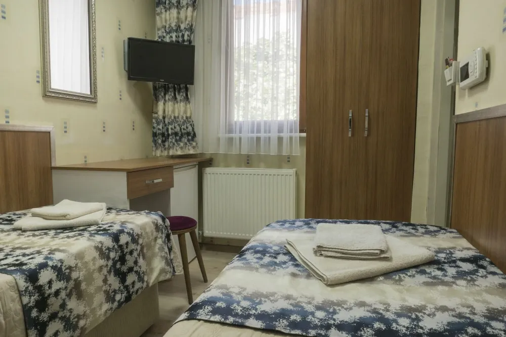 Comfort Tek Büyük veya İki Ayrı Yataklı Oda