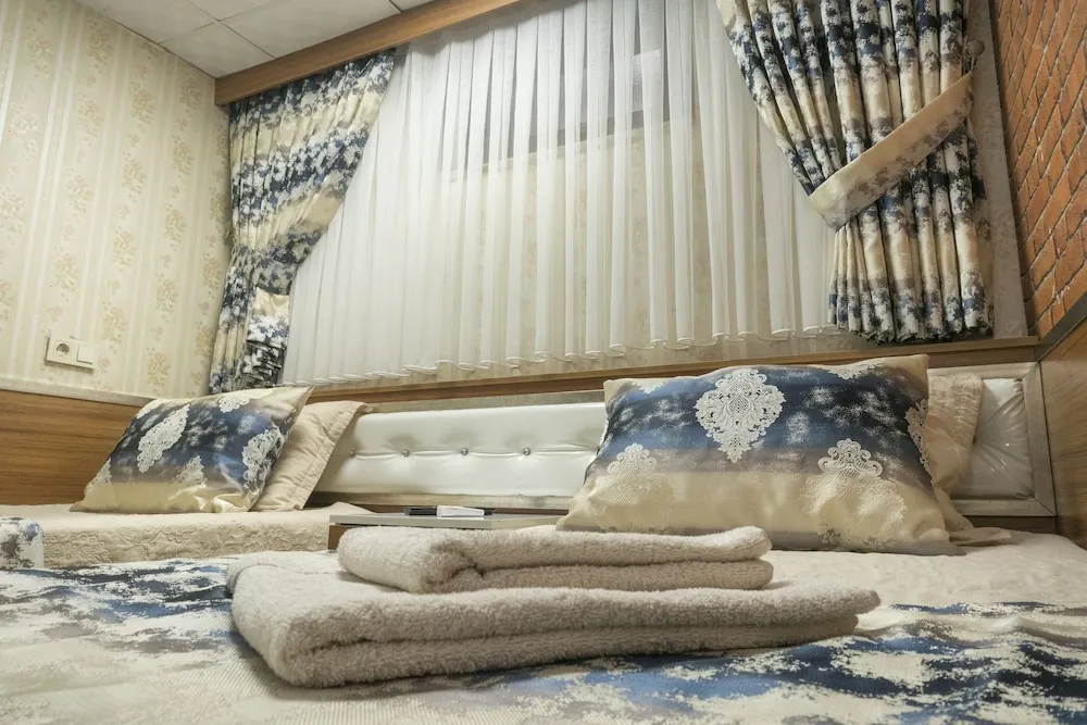 Deluxe Tek Büyük veya İki Ayrı Yataklı Oda