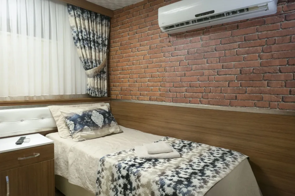 Deluxe Tek Büyük veya İki Ayrı Yataklı Oda