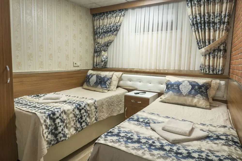 Deluxe Tek Büyük veya İki Ayrı Yataklı Oda
