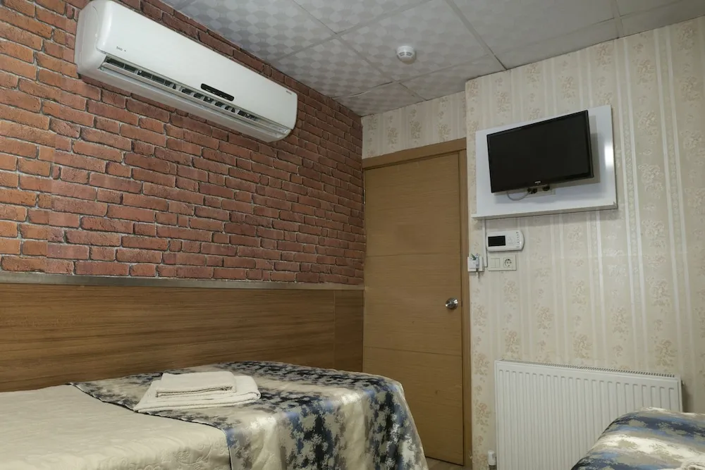 Deluxe Tek Büyük veya İki Ayrı Yataklı Oda