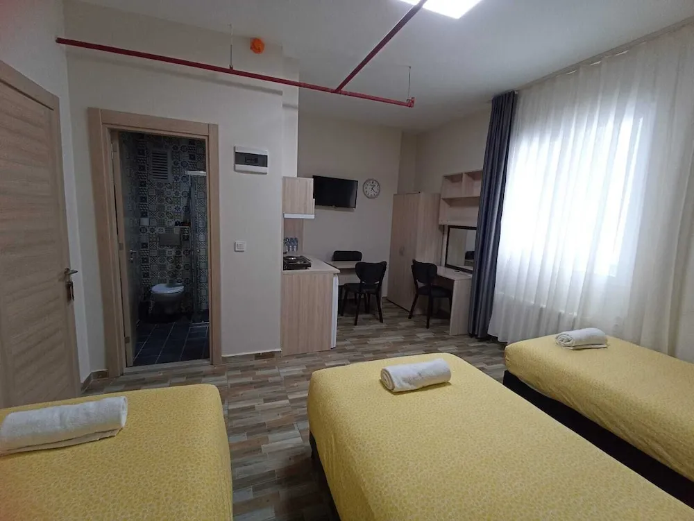 Deluxe Üç Kişilik Oda