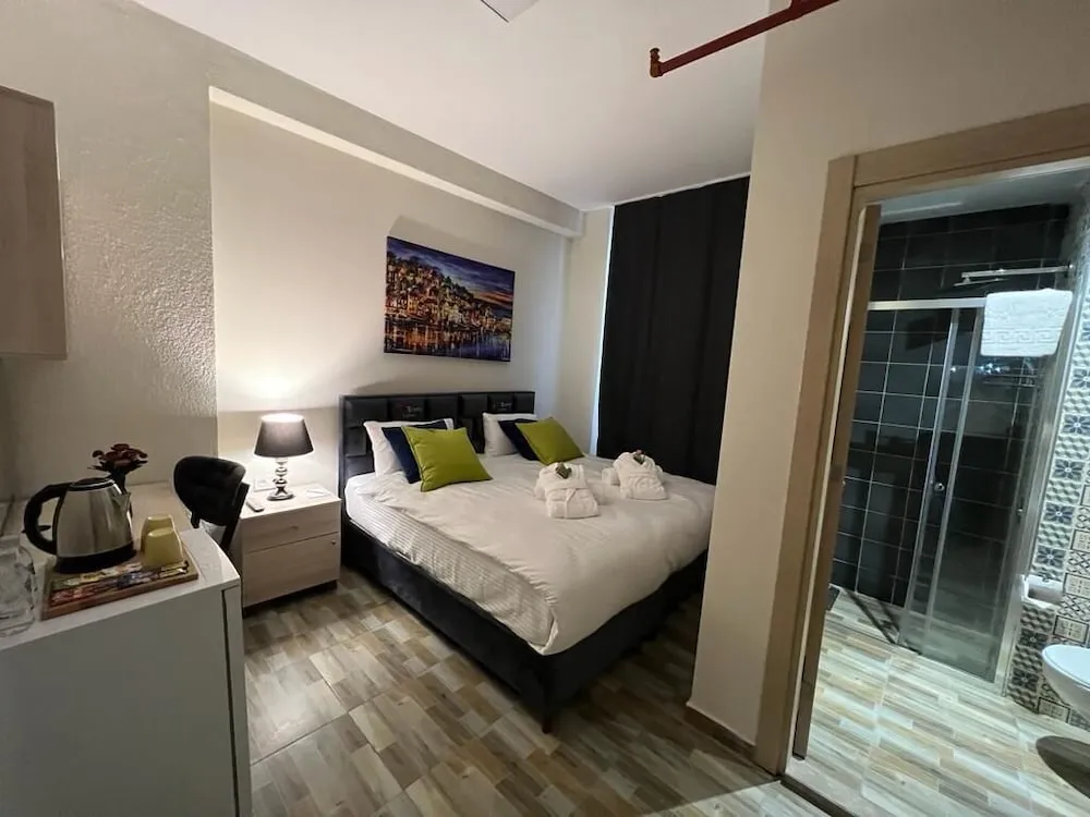 Deluxe Tek Büyük veya İki Ayrı Yataklı Oda