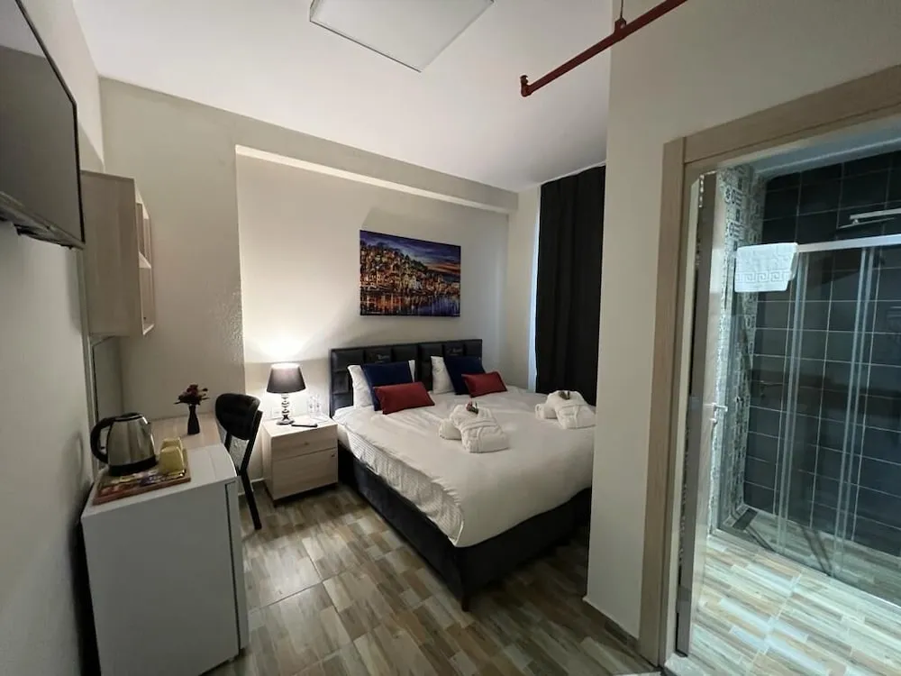 Deluxe Tek Büyük veya İki Ayrı Yataklı Oda