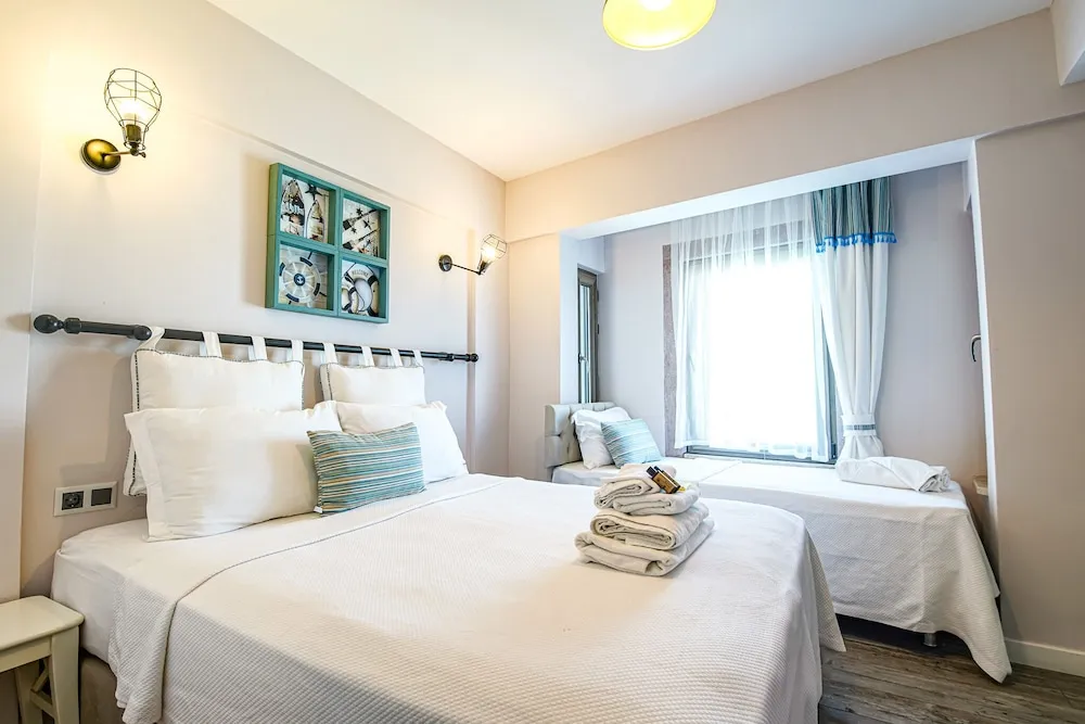 Deluxe Üç Kişilik Oda