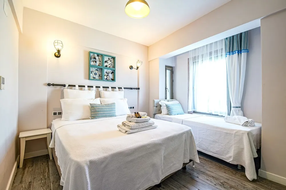 Deluxe Üç Kişilik Oda