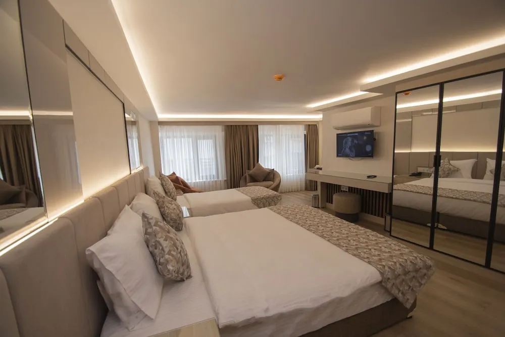 Deluxe Üç Kişilik Oda