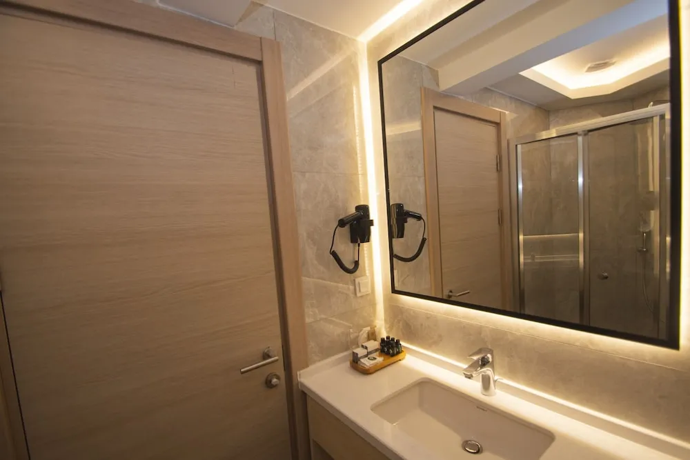 Deluxe Üç Kişilik Oda