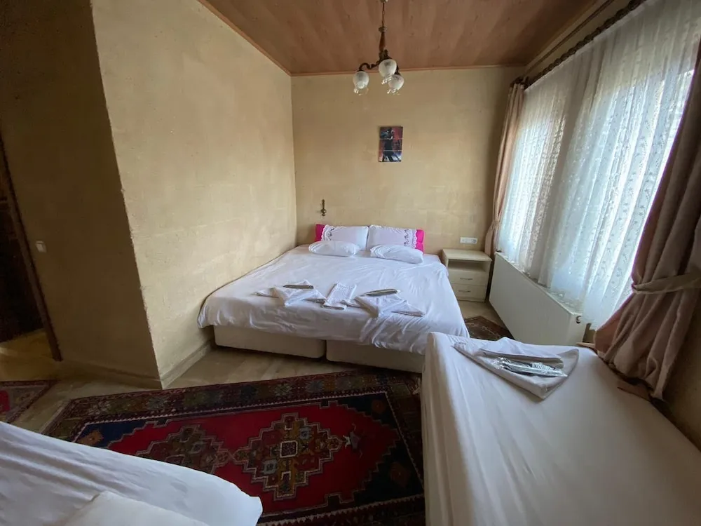Üç Kişilik Oda