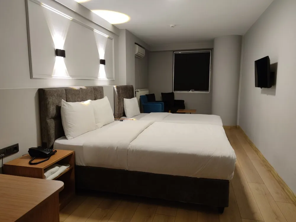 Deluxe Üç Kişilik Oda, Sigara İçilmez, Şehir Manzaralı