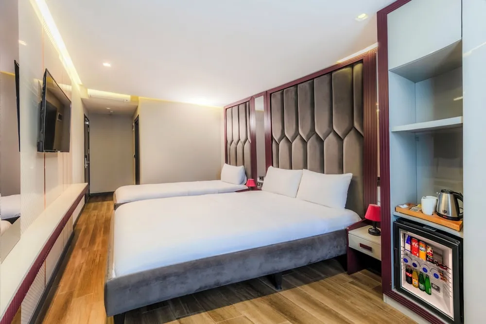 Deluxe Tek Büyük veya İki Ayrı Yataklı Oda