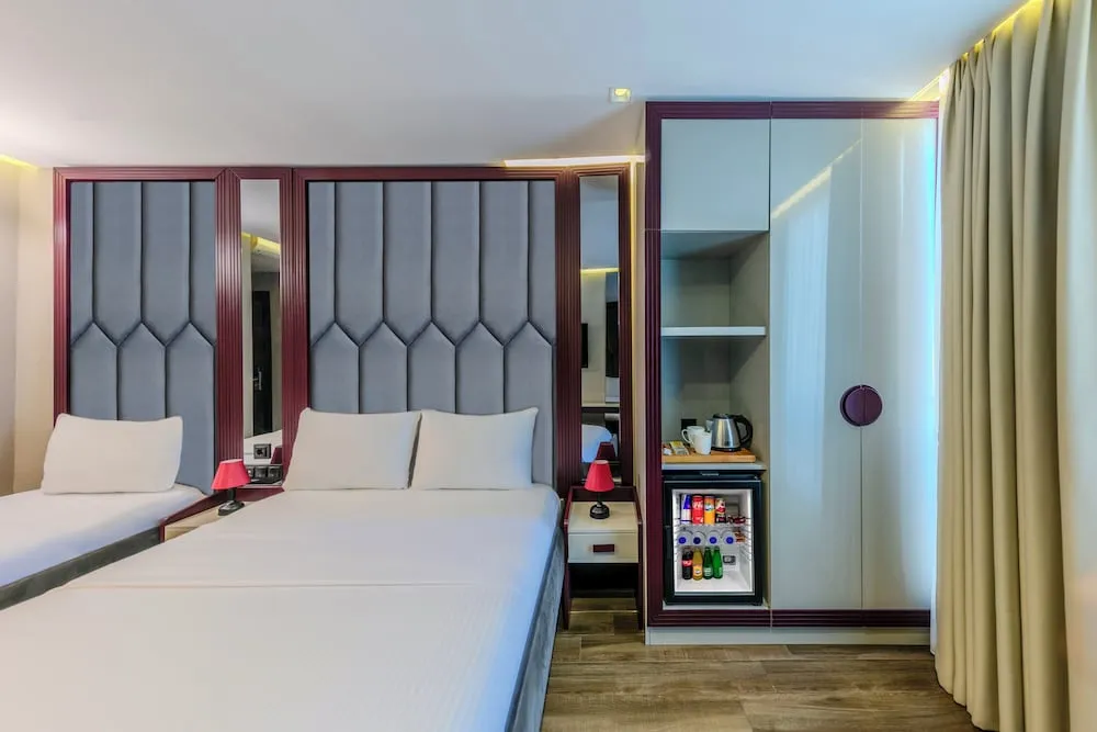 Deluxe Tek Büyük veya İki Ayrı Yataklı Oda