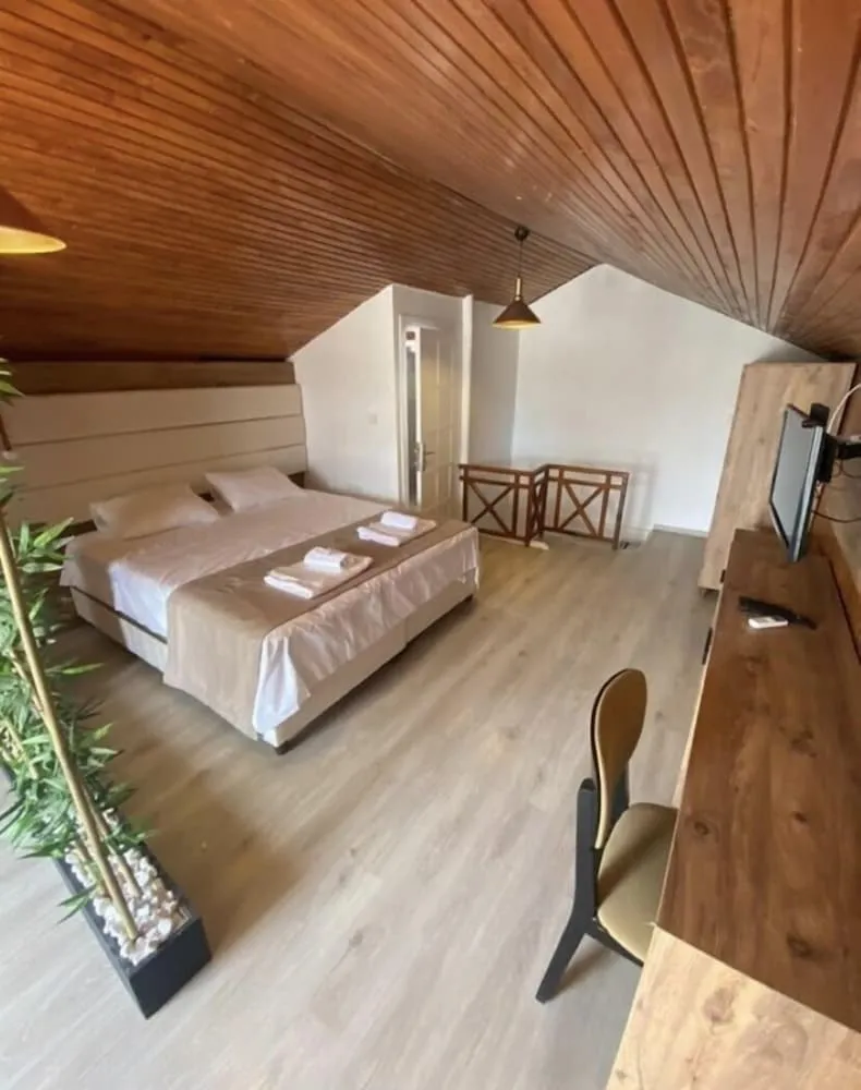 Deluxe Üç Kişilik Oda