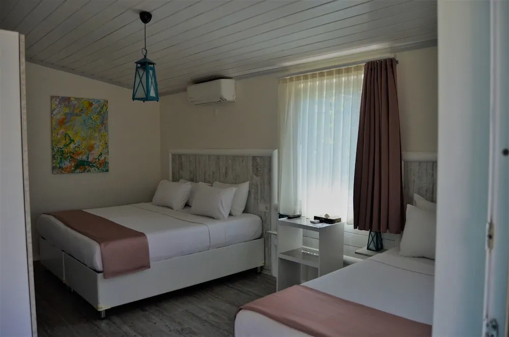 Deluxe Üç Kişilik Oda