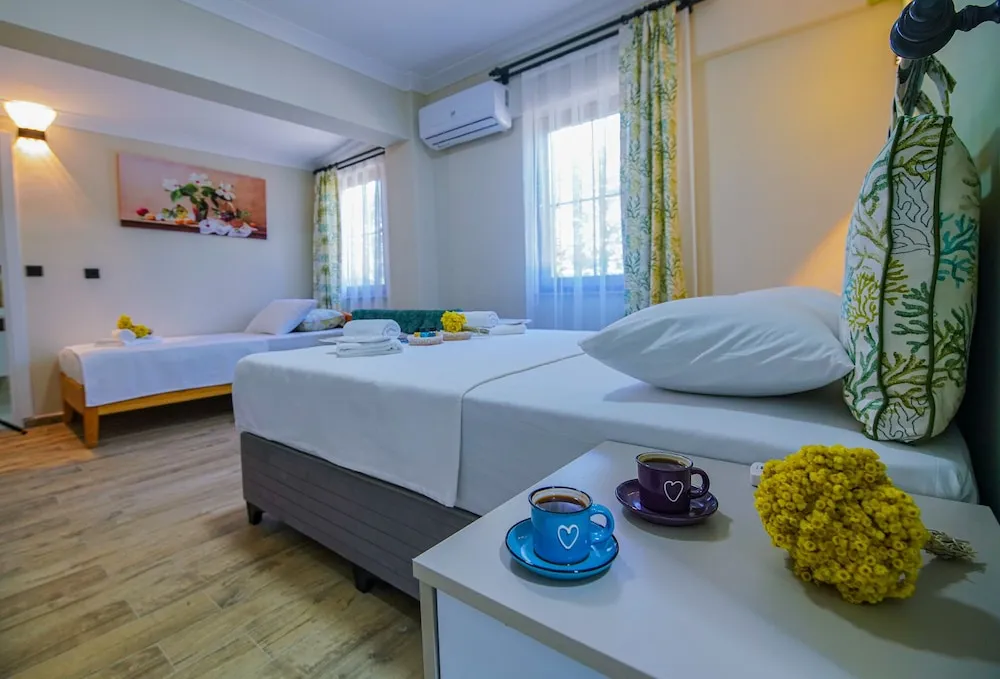 Deluxe Üç Kişilik Oda