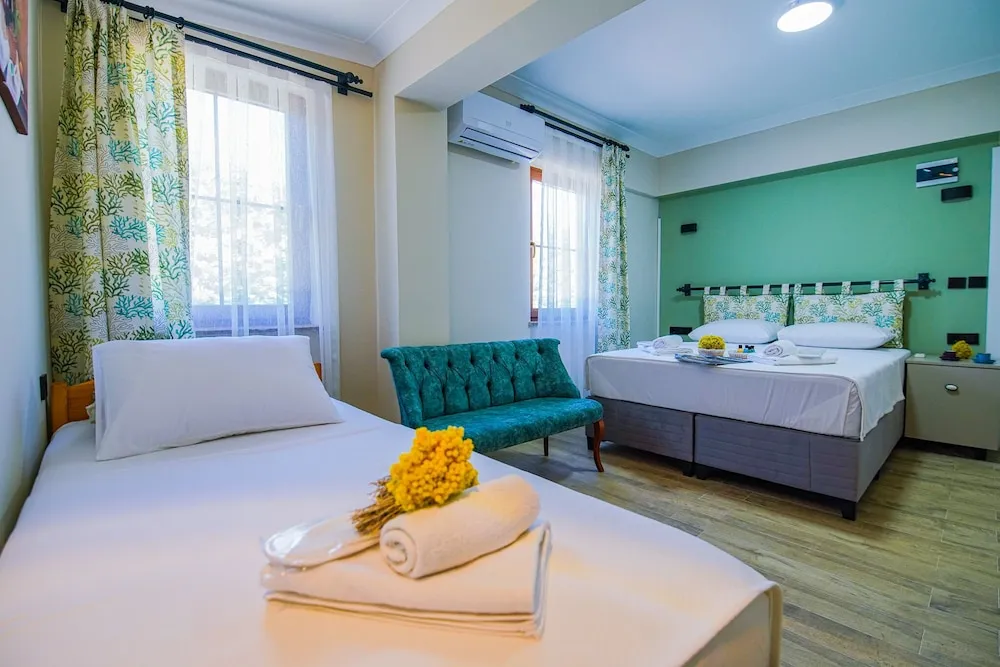 Deluxe Üç Kişilik Oda