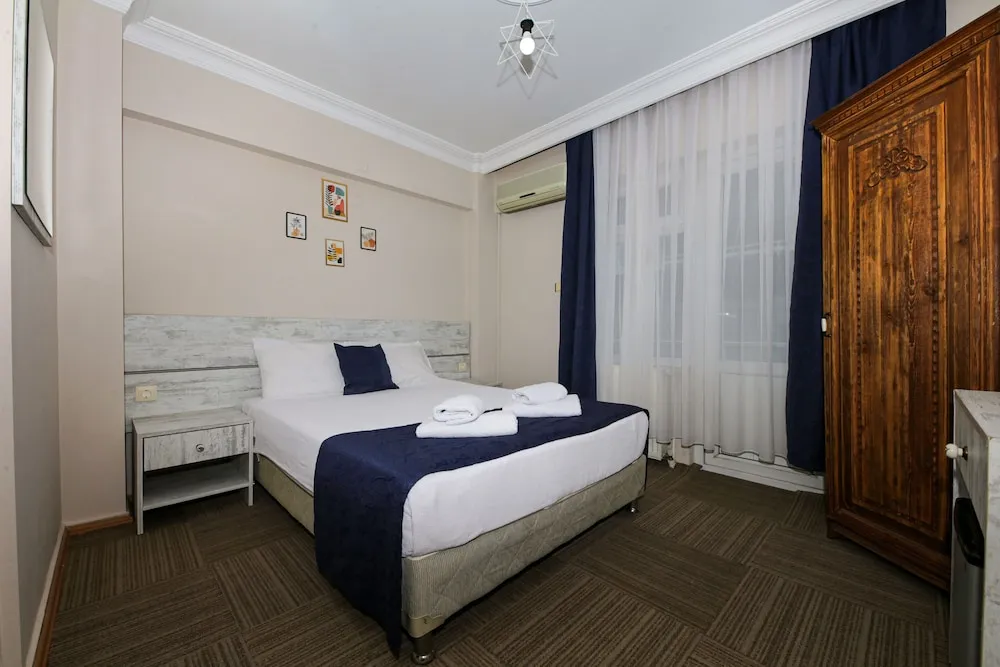 Deluxe Tek Büyük Yataklı Oda, Sigara İçilebilir, Deniz Manzaralı